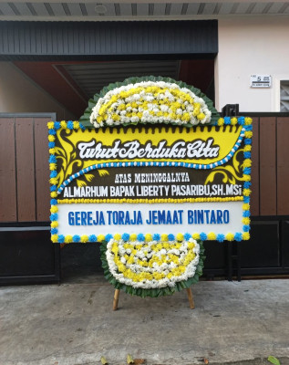 Papan Bunga Duka di Mindiptana